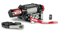 Angled view of the WARN R45 4,500 lb ATV/UTV winch with 50 ft steel rope and roller fairlead