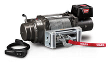 Angled view of the WARN M12 24V 12,000 lb truck, Jeep, and SUV winch with 125 ft steel rope and roller fairlead