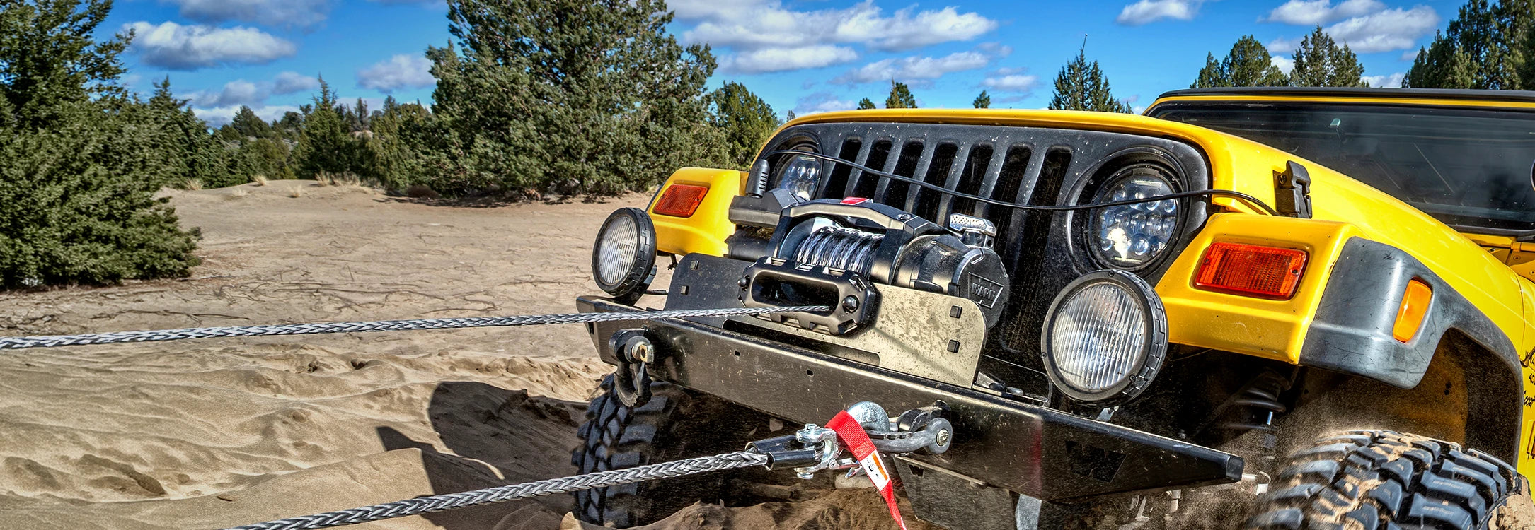 WARN ZEON XC winch with synthetic rope and Epic hawse fairlead in sleek satin black finish, compact off-road recovery winch