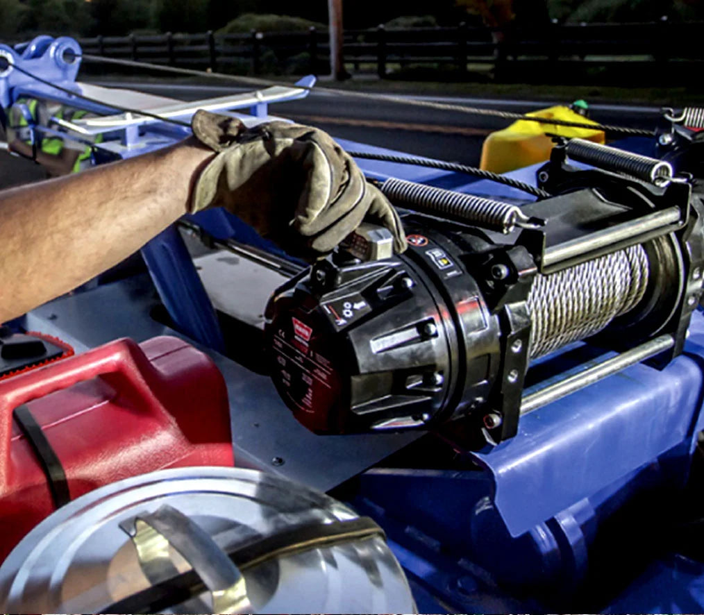 WARN industrial winch gear and equipment engineered for heavy-duty applications, including hydraulic winches, hoists, and load-handling systems