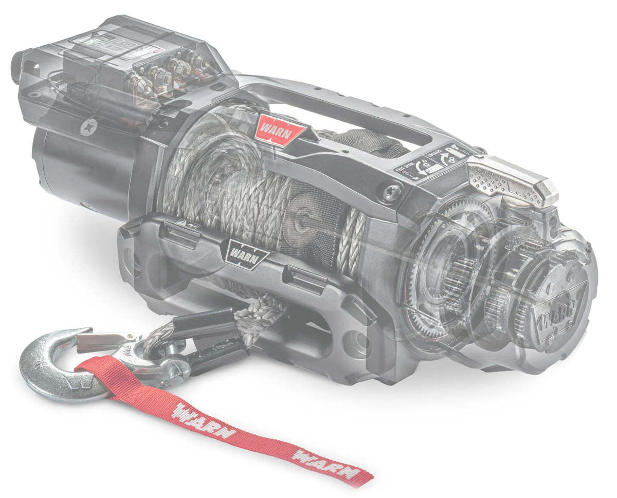 Transparent cutaway of a WARN ZEON XC winch showing the motor, synthetic rope drum, planetary gear train, and control pack inside the housing
